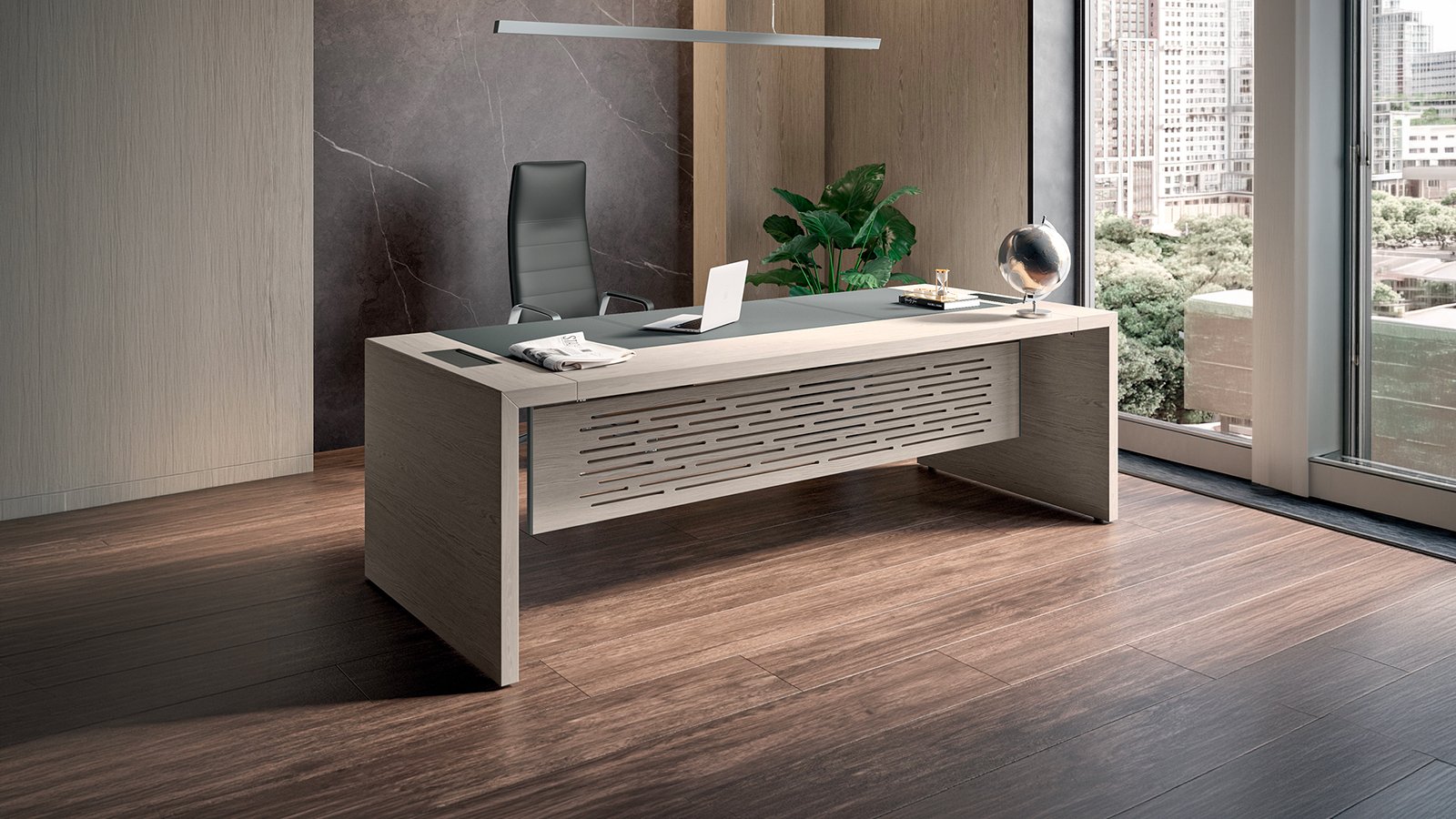 Scrivania e-10 di Quadrifoglio con piano in noce americano nell'ufficio direzionale