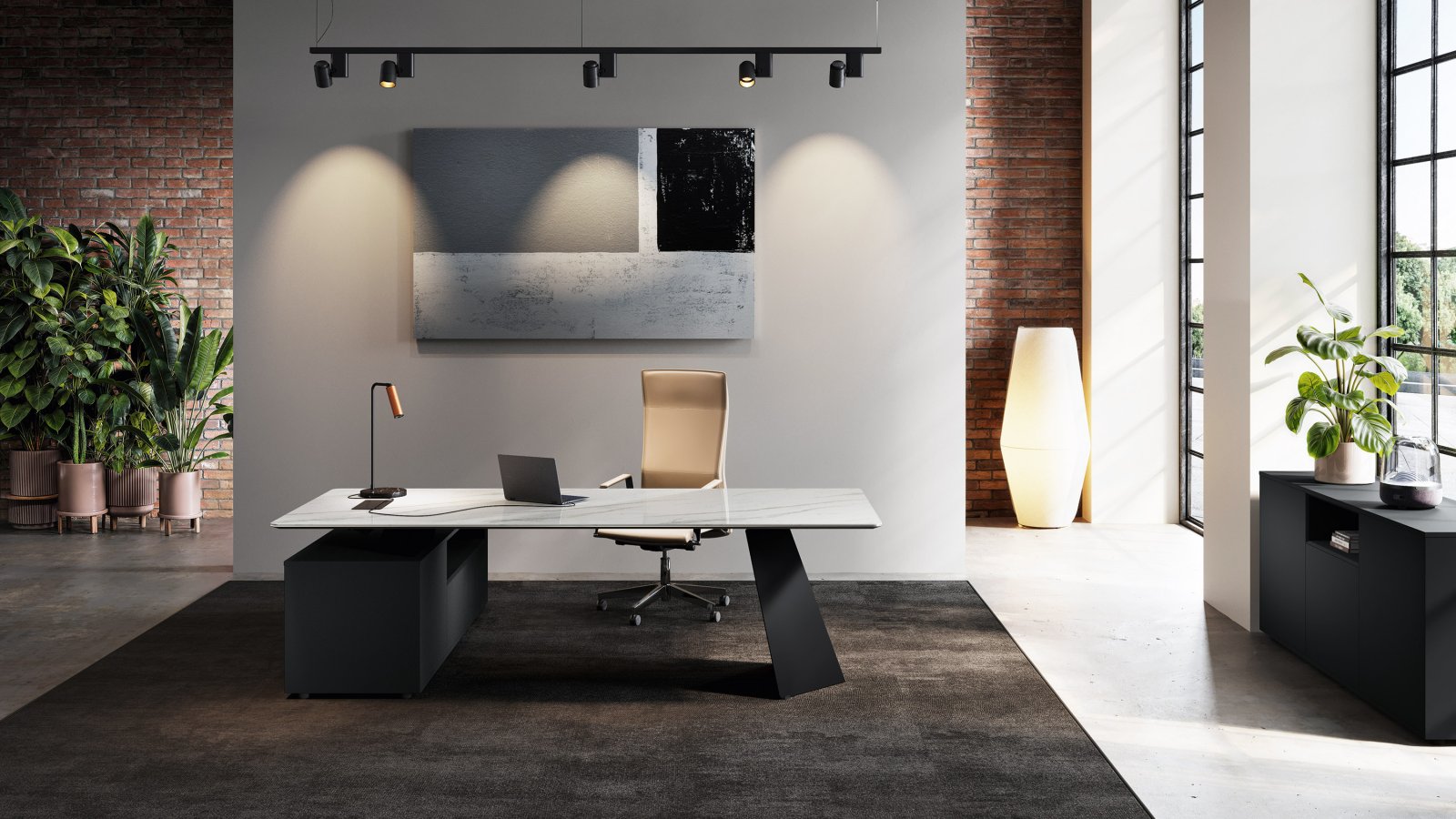 Dettaglio del piano in ceramica Nero Desirè sulla scrivania direzionale Monolith