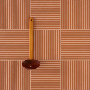 Reception con tappeto ceramico Fringe