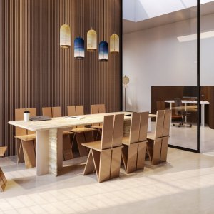 Tavolo riunioni Ginza di Codutti con piano in travertino romano e base a due pannelli