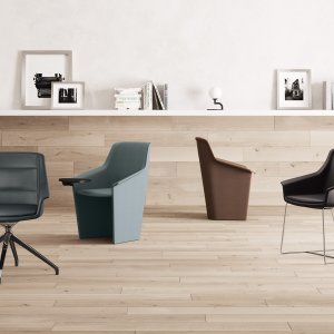 Dettaglio della trapuntatura artigianale in tinta della poltrona Jera Chair