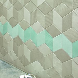 Area break con parete Tex color Blue e tavoli in rovere