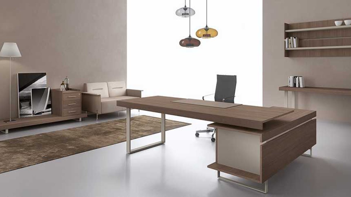 Arredamento studio fotografico: la postazione di ritocco, il tavolo per i clienti, l'archivio