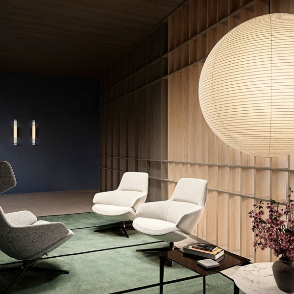 Lounge aziendale con poltroncine e sedute di design Arper